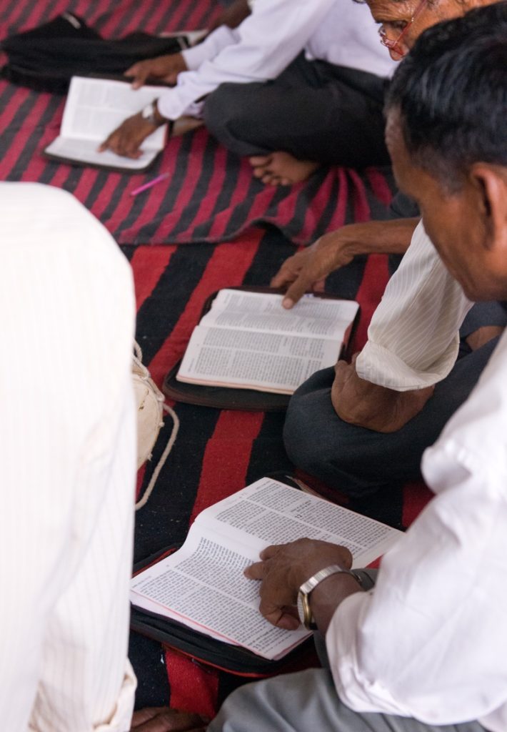 Pastors in India studying the Bible during a Langham Preaching training session. 